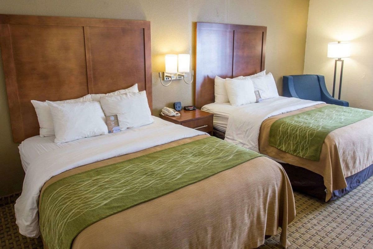 Premium bedding, desk, blackout drapes, iron/ironing board
