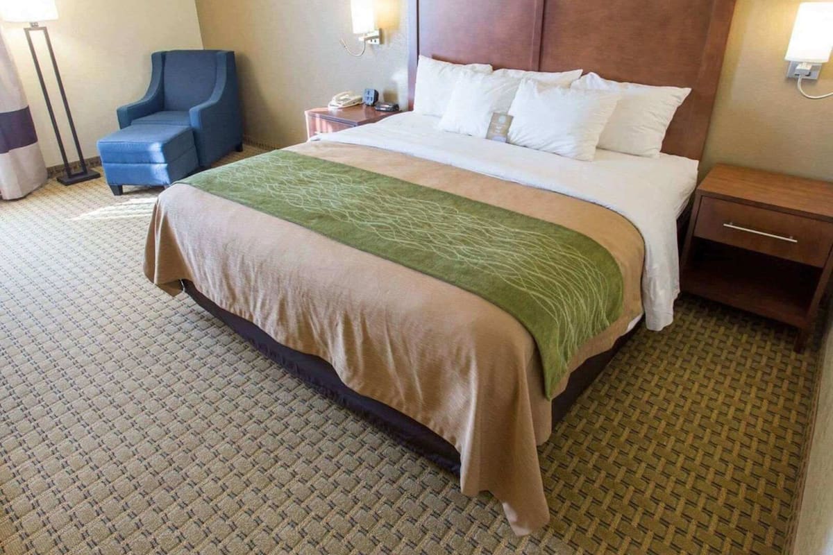 Premium bedding, desk, blackout drapes, iron/ironing board