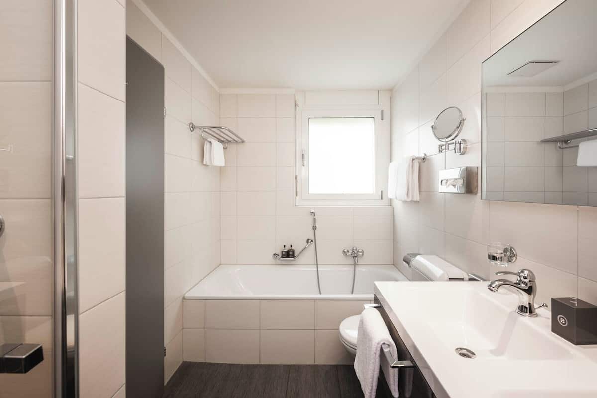 suite, balcony (lake & mountain view) | 1 bedroom, premium bedding, down duvets, minibar