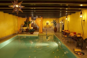 Indoor pool, open 6:30 AM to 9:00 PM, pool loungers