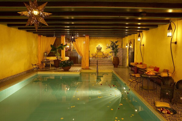 Indoor pool, open 6:30 AM to 9:00 PM, pool loungers