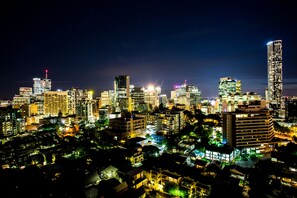 Experience the vibrant city atmosphere with its diverse architecture and bustling energy.