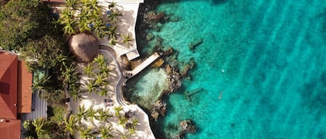 Private beach, sun loungers, beach massages, scuba diving