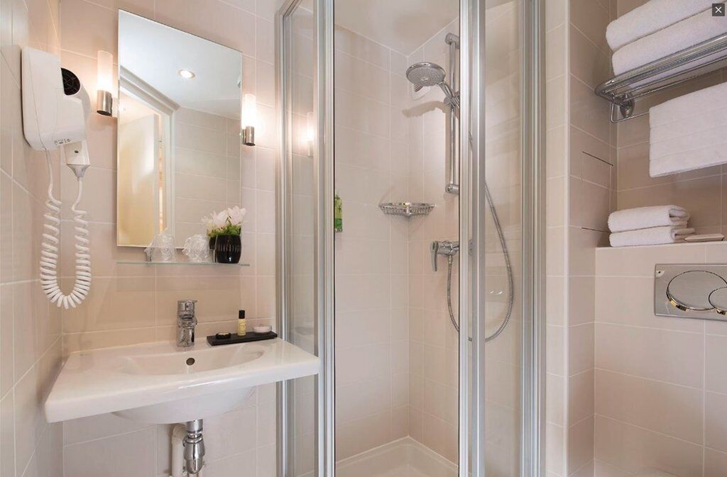 shower, free toiletries, hair dryer, towels