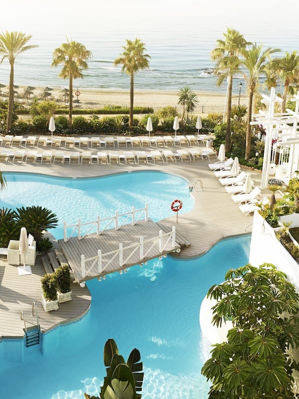 5 outdoor pools, open 10:00 AM to 7:00 PM, pool umbrellas, sun loungers