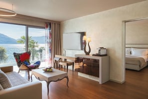 Deluxe Suite, Lake View | Living area | 45-inch flat-screen TV with cable channels, TV, pay movies - Hotel Eden Roc (Ascona)