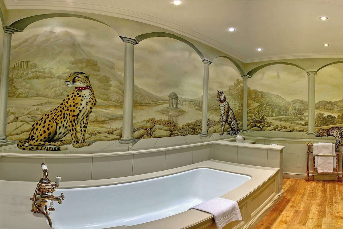 deluxe suite, 1 king bed, non smoking (four poster bed) | premium bedding, desk, laptop workspace, iron/ironing board