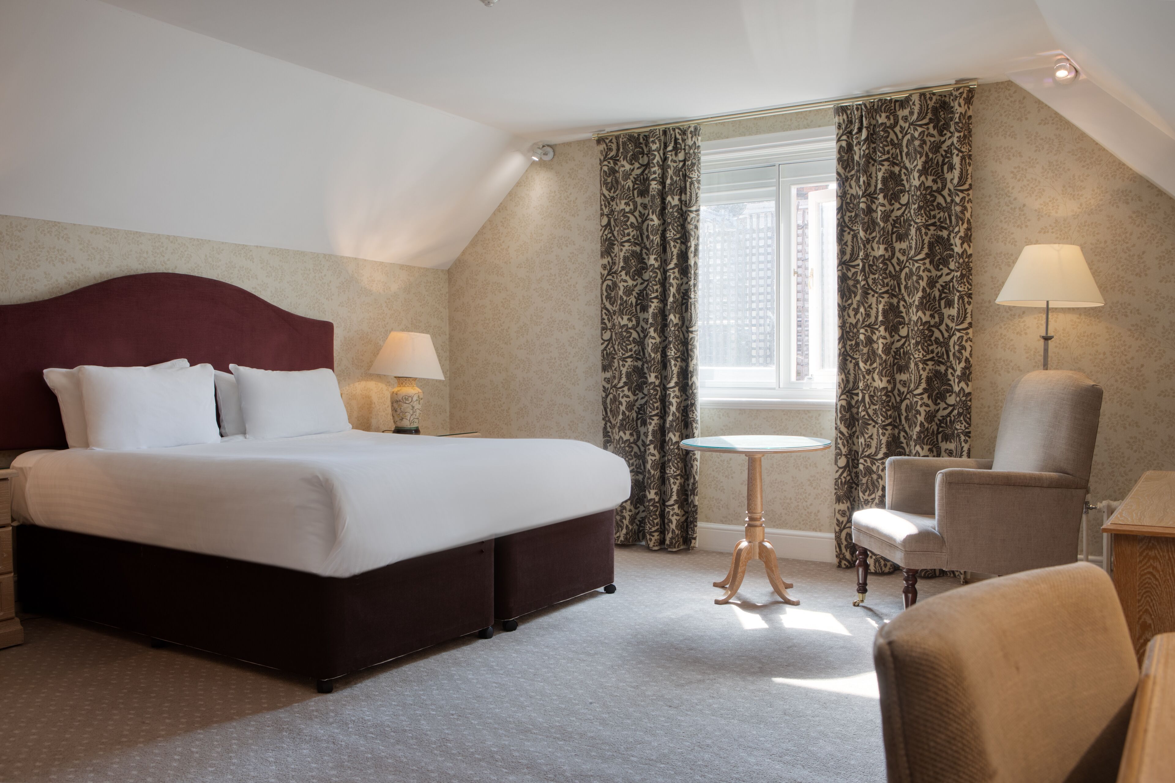 Premium bedding, desk, laptop workspace, iron/ironing board