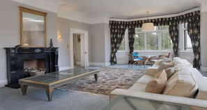 Premium bedding, desk, laptop workspace, iron/ironing board