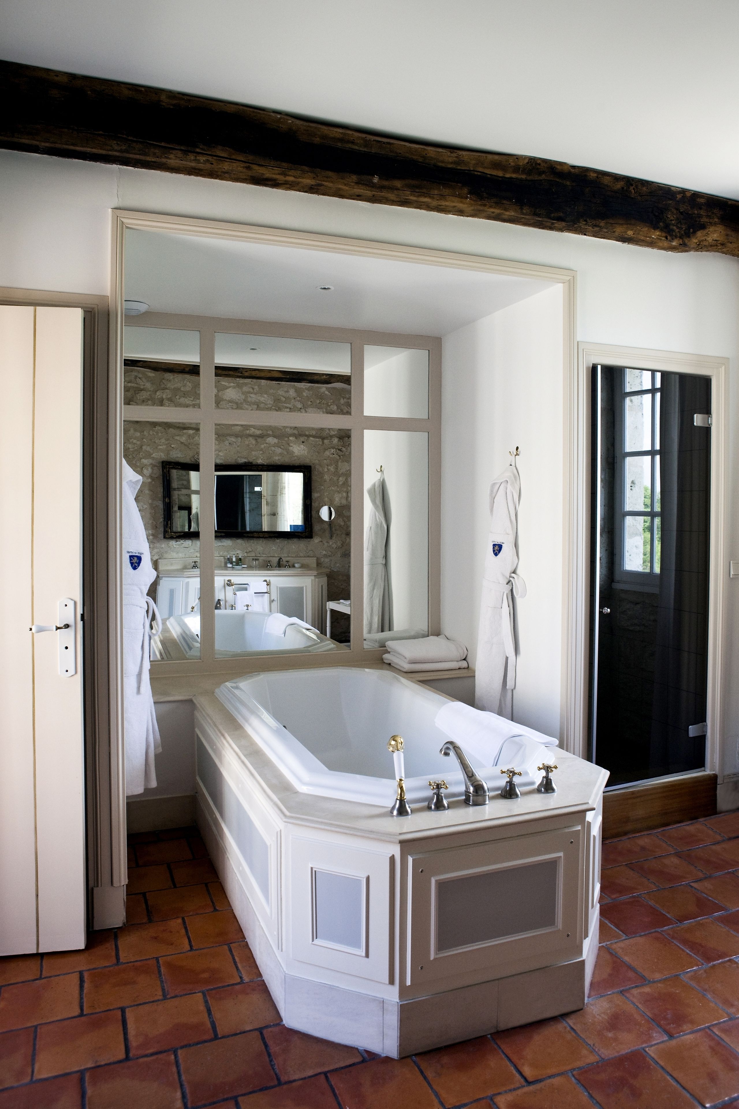 prestige suite | bathroom | combined shower/bathtub, designer toiletries, hair dryer, bathrobes