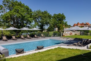 Indoor pool, outdoor pool, pool umbrellas