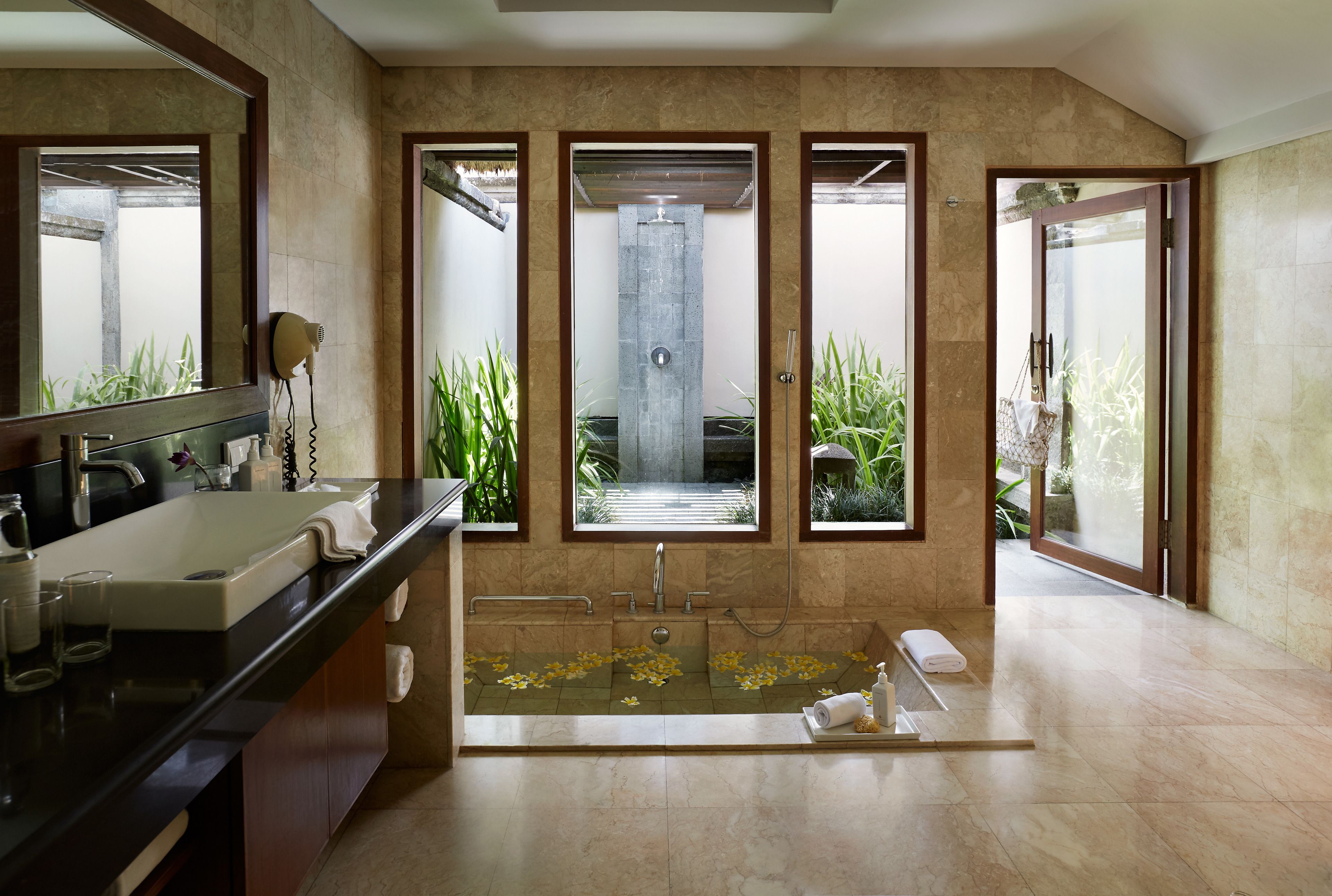 separate bathtub and shower, deep-soaking bathtub, rainfall showerhead