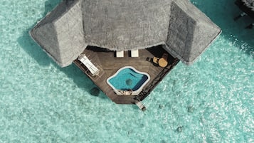 Sunset Lagoon Villa | Minibar, in-room safe, individually decorated, individually furnished