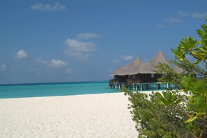 Lagoon Villa | Beach | Private beach, white sand, sun loungers, beach umbrellas