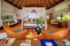 Beach Villa | Minibar, in-room safe, individually decorated, individually furnished