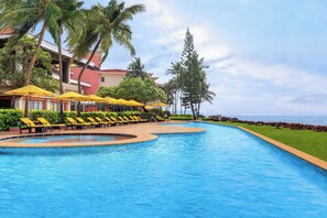 2 outdoor pools, open 10:00 AM to 7:00 PM, free cabanas, pool umbrellas