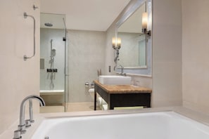 Separate tub and shower, deep soaking tub, free toiletries, hair dryer