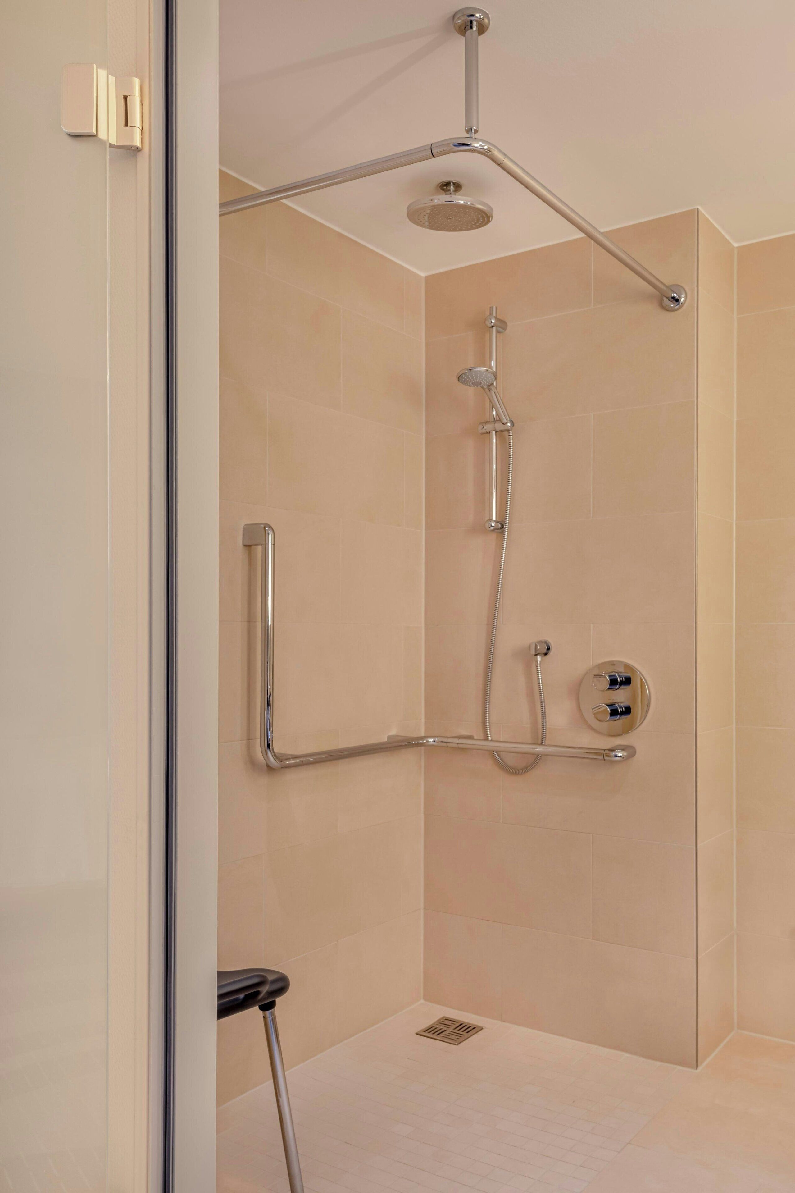 combined shower/bathtub, free toiletries, hair dryer, bathrobes