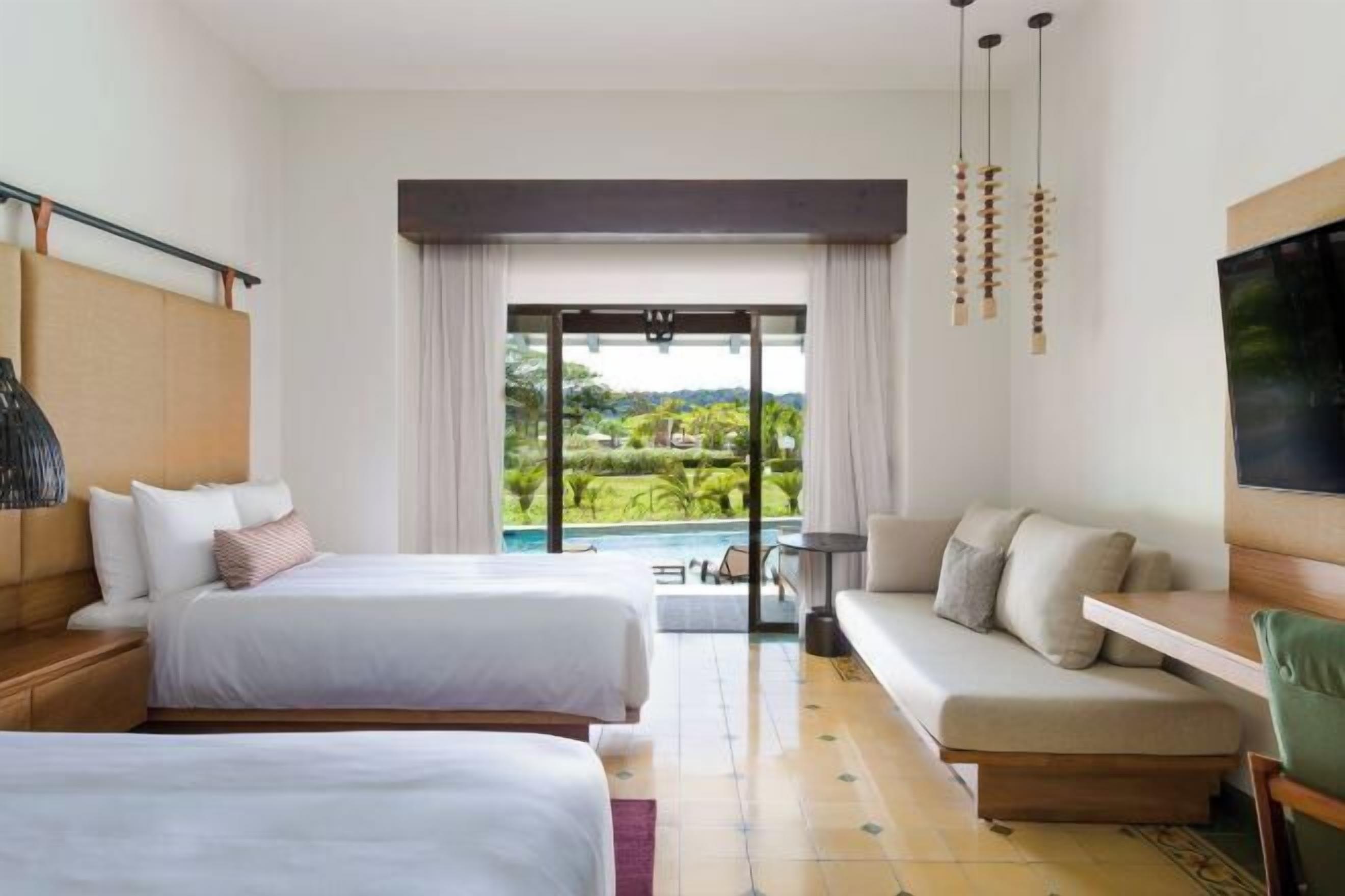 Hypo-allergenic bedding, down duvets, minibar, in-room safe