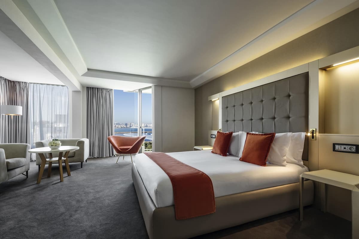 Junior Suite, 1 King Bed, Sea View | 1 bedroom, minibar, in-room safe, desk
