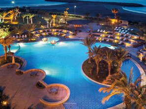Outdoor pool, pool umbrellas, sun loungers