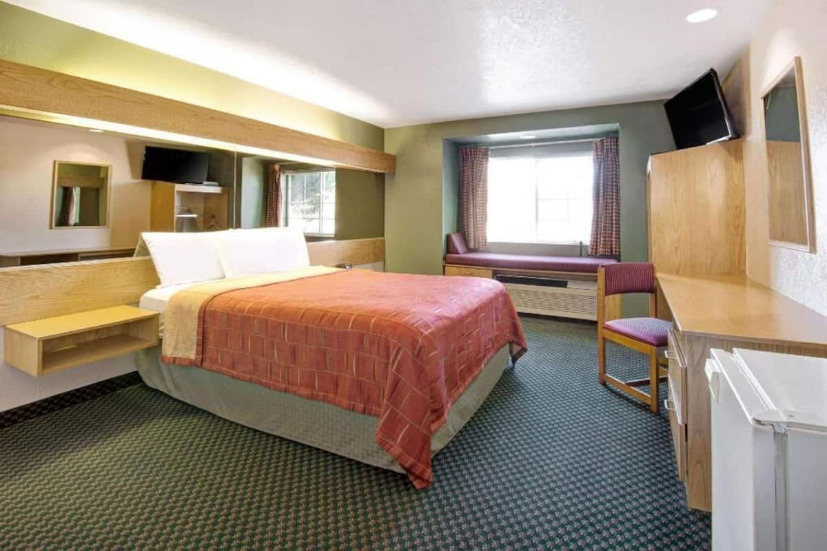 Pillow-top beds, desk, blackout curtains, WiFi