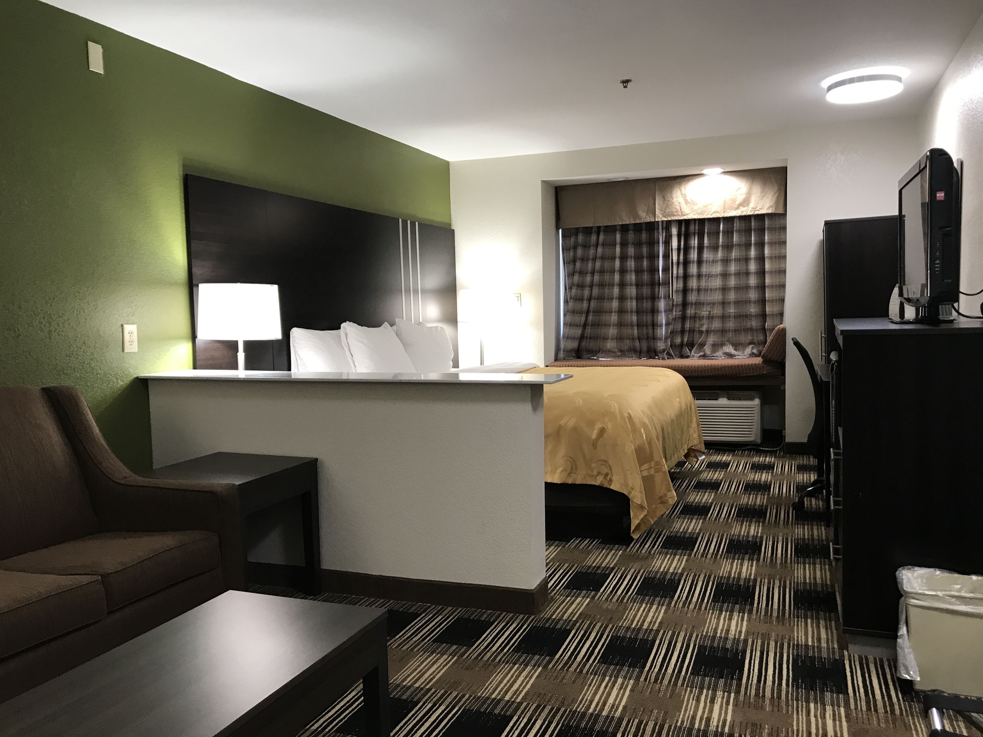 suite, 1 king bed, non smoking | premium bedding, desk, blackout curtains, iron/ironing board