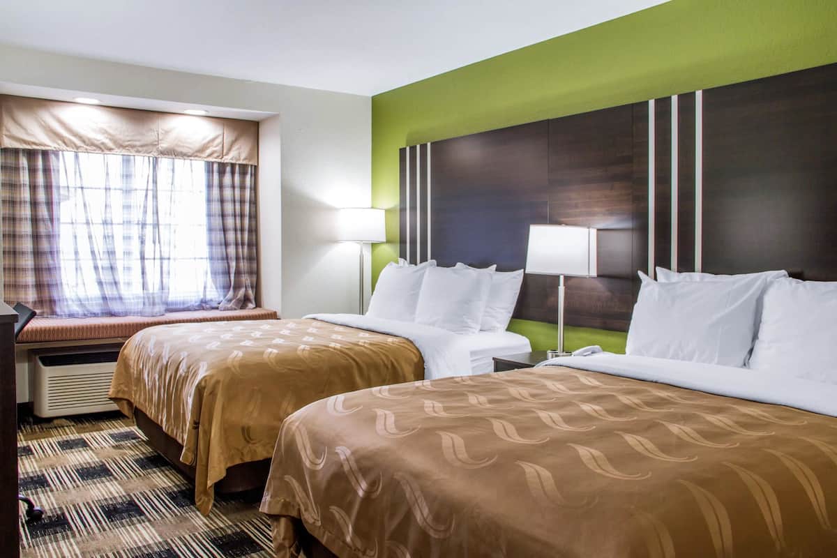 Premium bedding, desk, blackout drapes, iron/ironing board