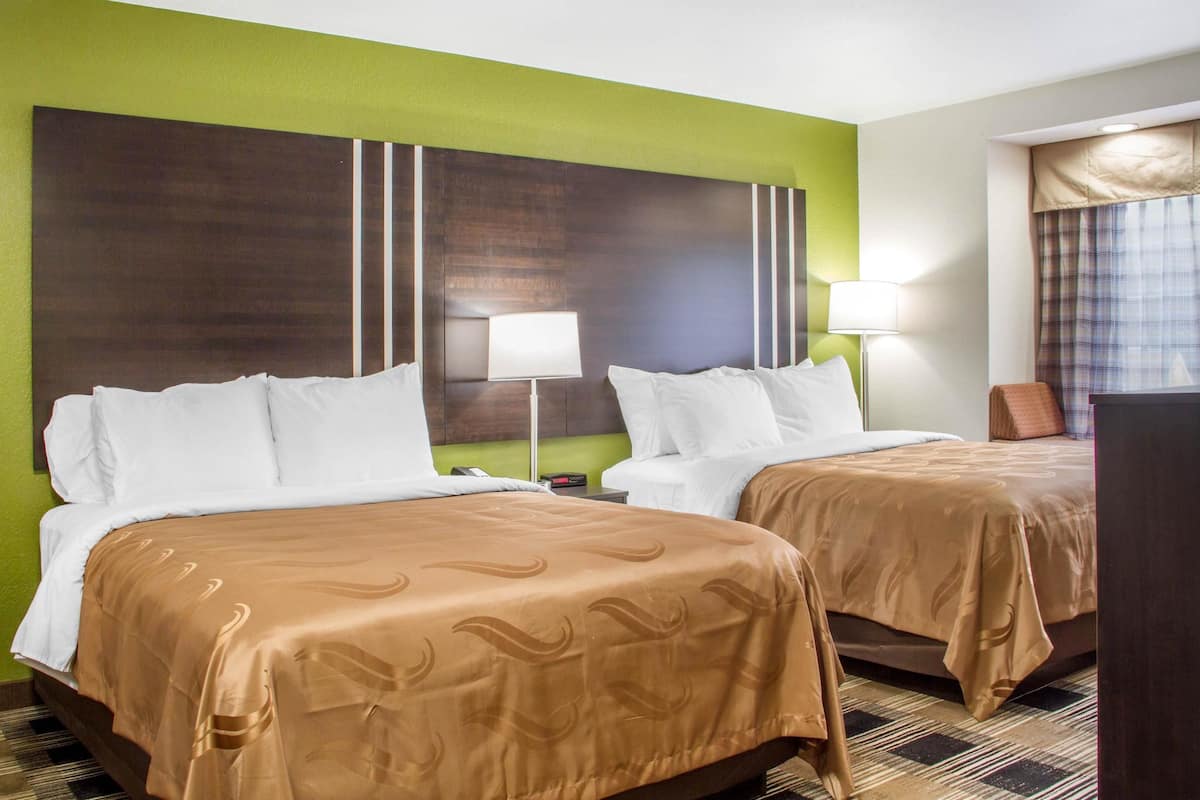 premium bedding, desk, blackout curtains, iron/ironing board