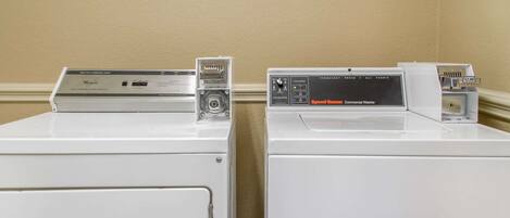 Two front-loading washing machines with control panels, one with a front-loading door and the other with a top-loading door.