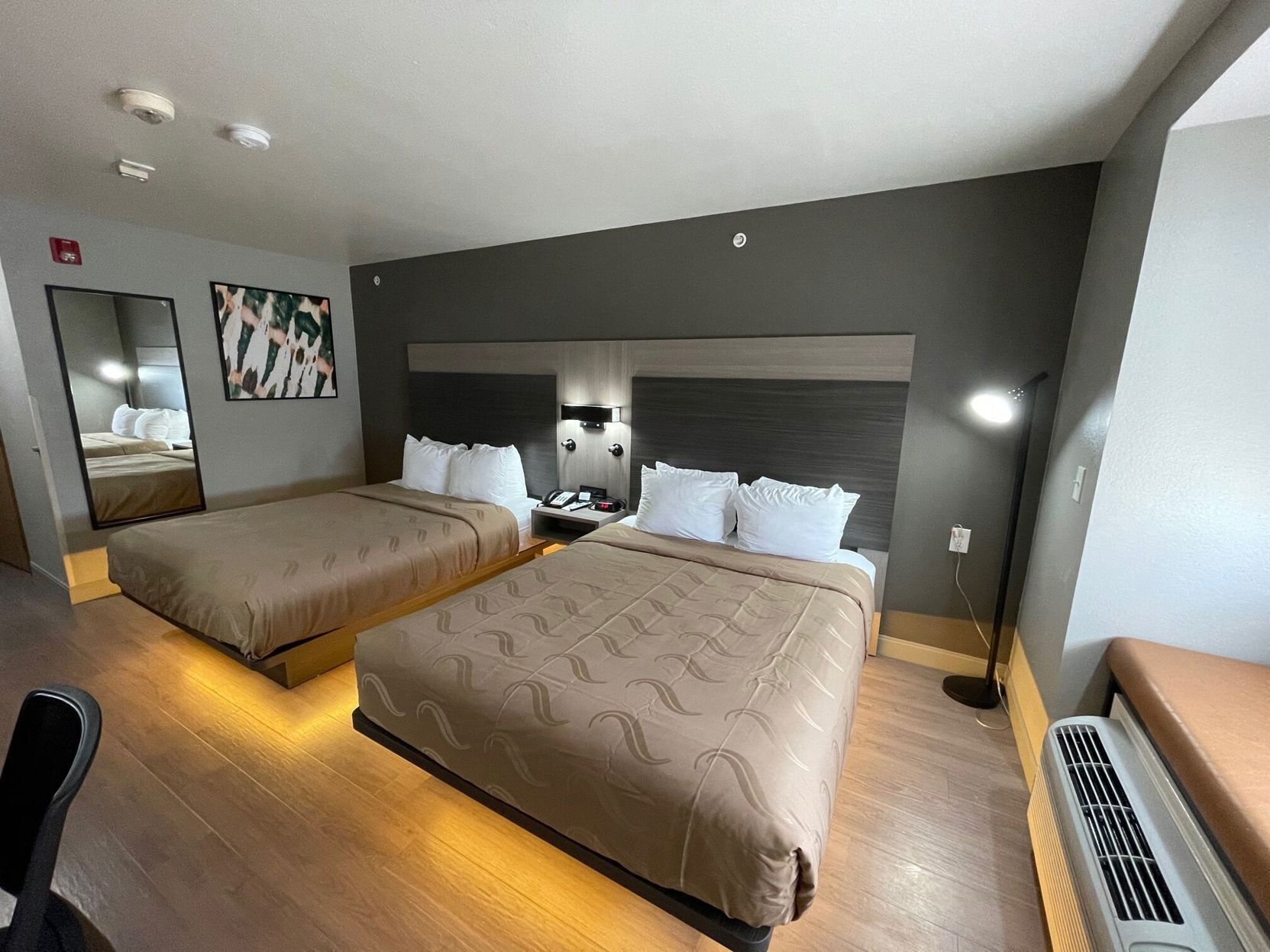 Down duvets, desk, laptop workspace, free cots/infant beds