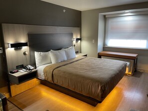 Down duvets, desk, laptop workspace, free cots/infant beds