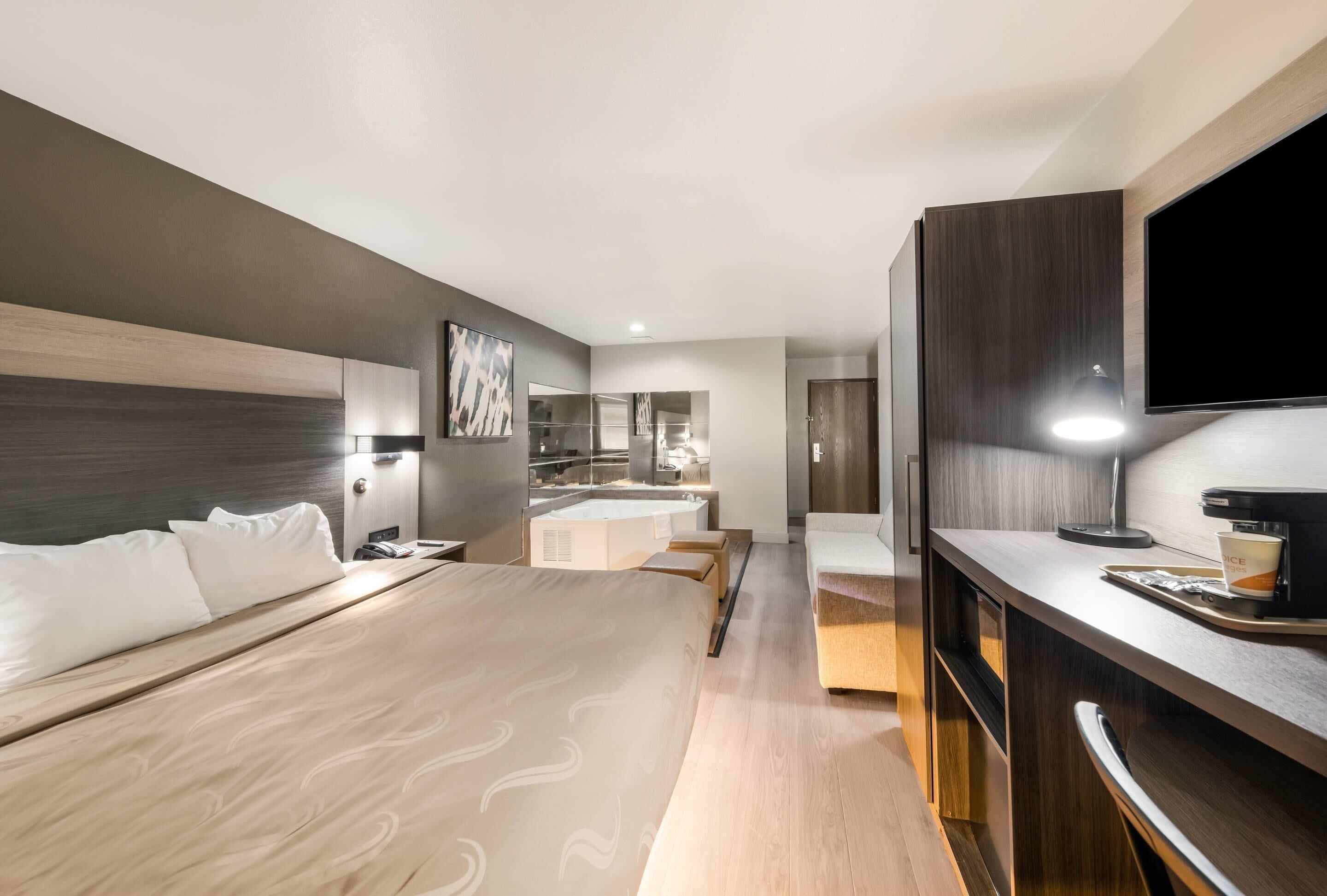 Down duvets, desk, laptop workspace, free cots/infant beds