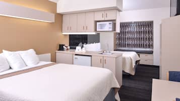 Suite, 2 Queen Beds, Non Smoking | In-room safe, desk, blackout drapes, iron/ironing board