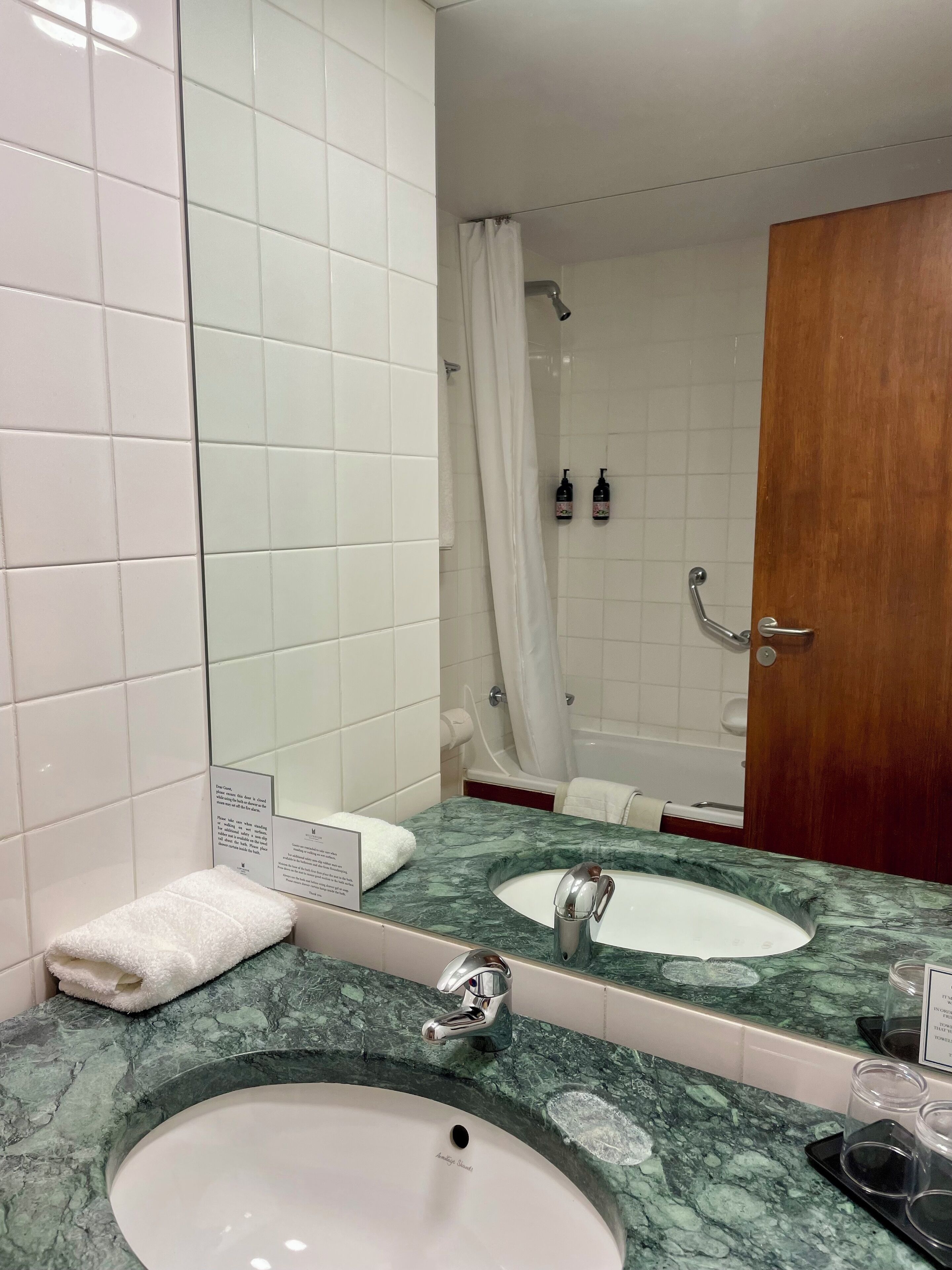 combined shower/bathtub, free toiletries, hair dryer, towels