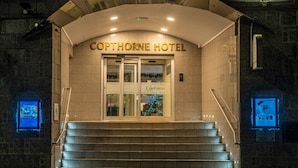 The entrance to the Copthorne Hotel with a set of stairs leading up to the entrance. - Copthorne Hotel Aberdeen (Aberdeen)