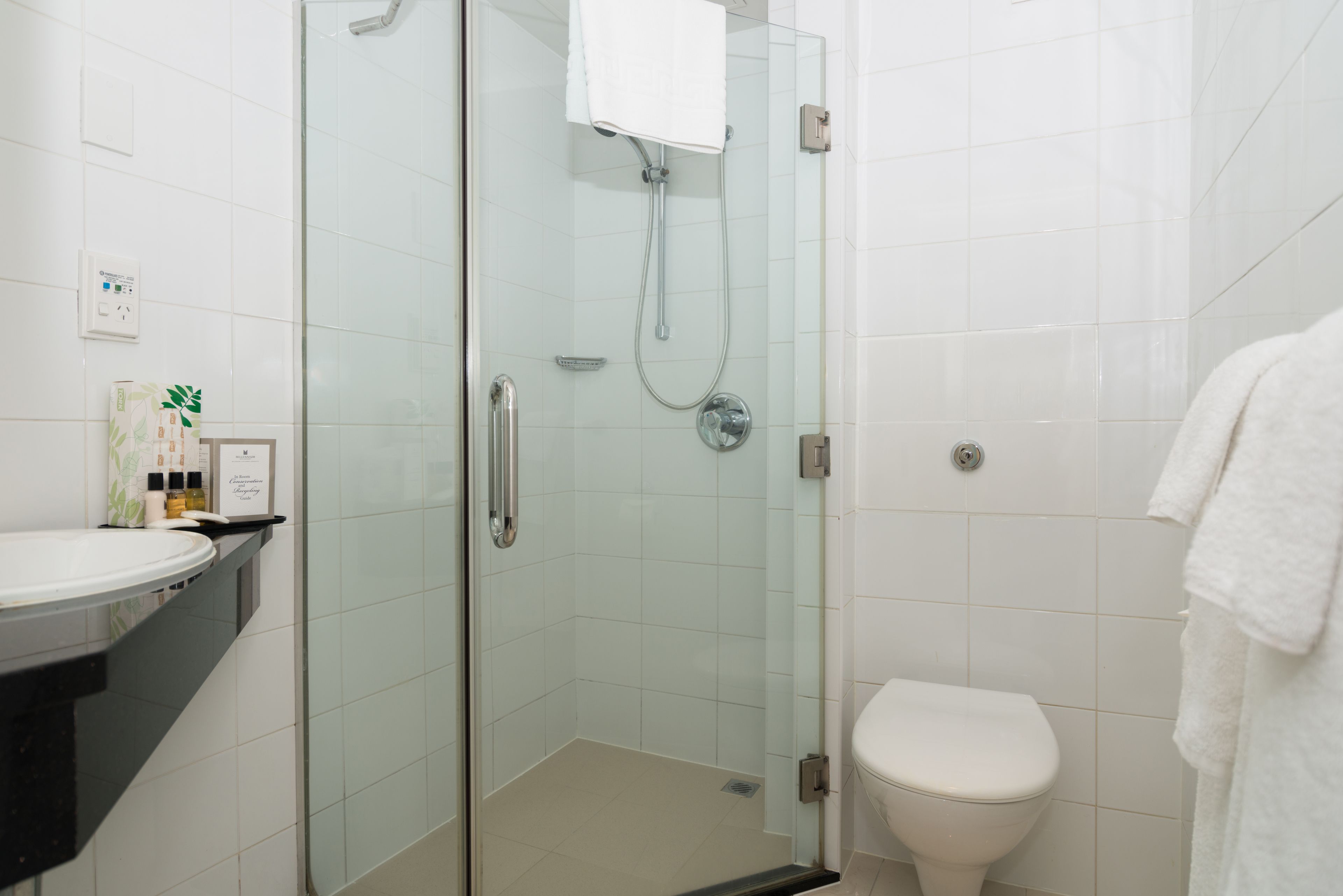 Shower, eco-friendly toiletries, hair dryer, towels