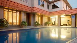 Outdoor pool, open 7:00 AM to 8:00 PM, sun loungers