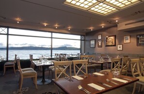 Breakfast, lunch, dinner served; local cuisine, beach views 