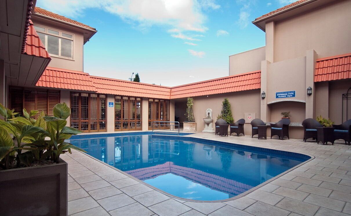 Outdoor pool, a heated pool, open 7:00 AM to 8:00 PM, sun loungers