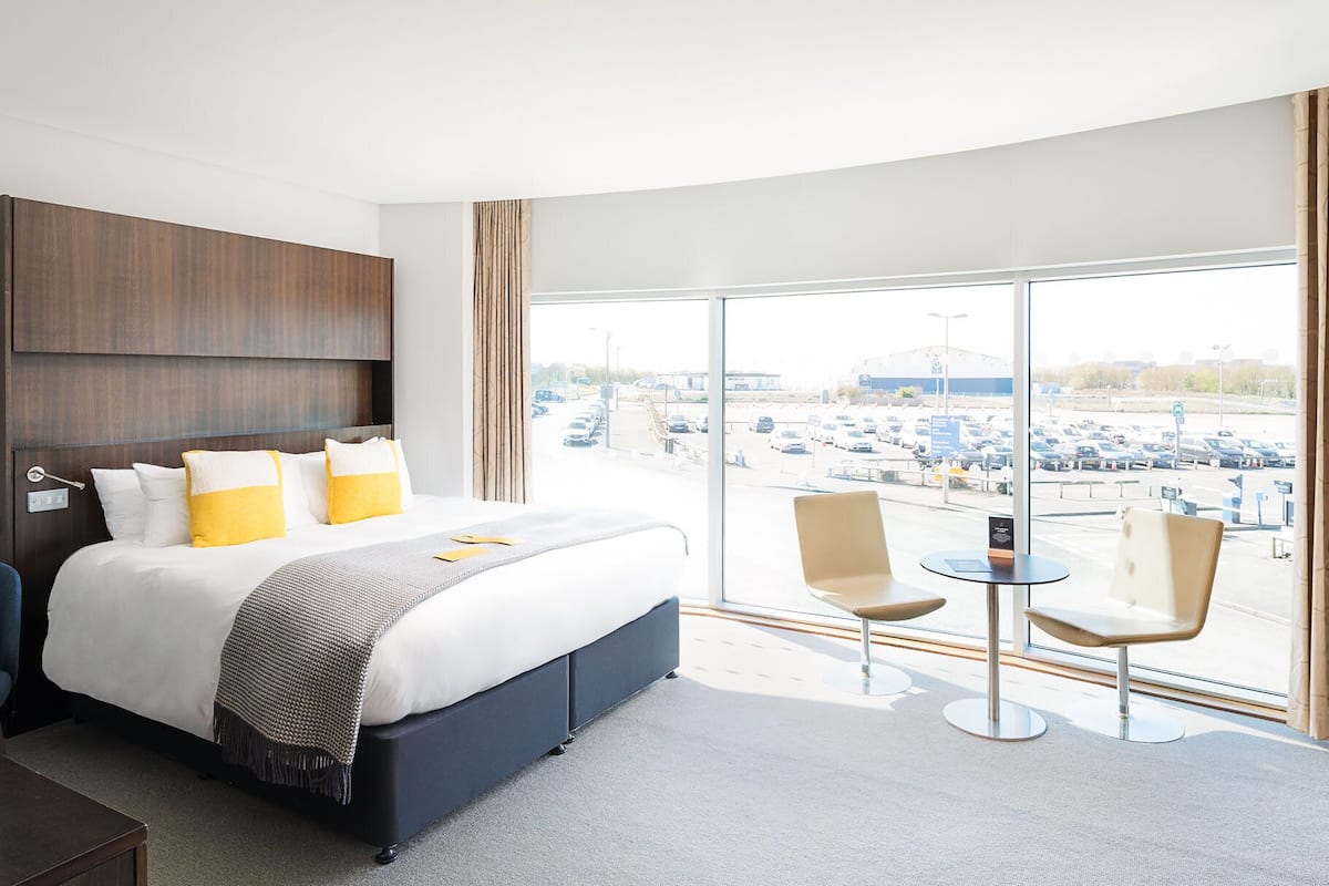 premium room, 1 king bed | 1 bedroom, in-room safe, desk, iron/ironing board