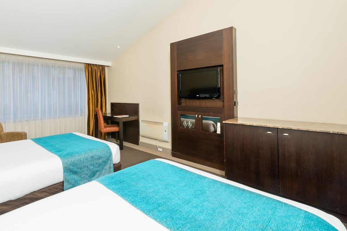 In-room safe, desk, blackout curtains, iron/ironing board