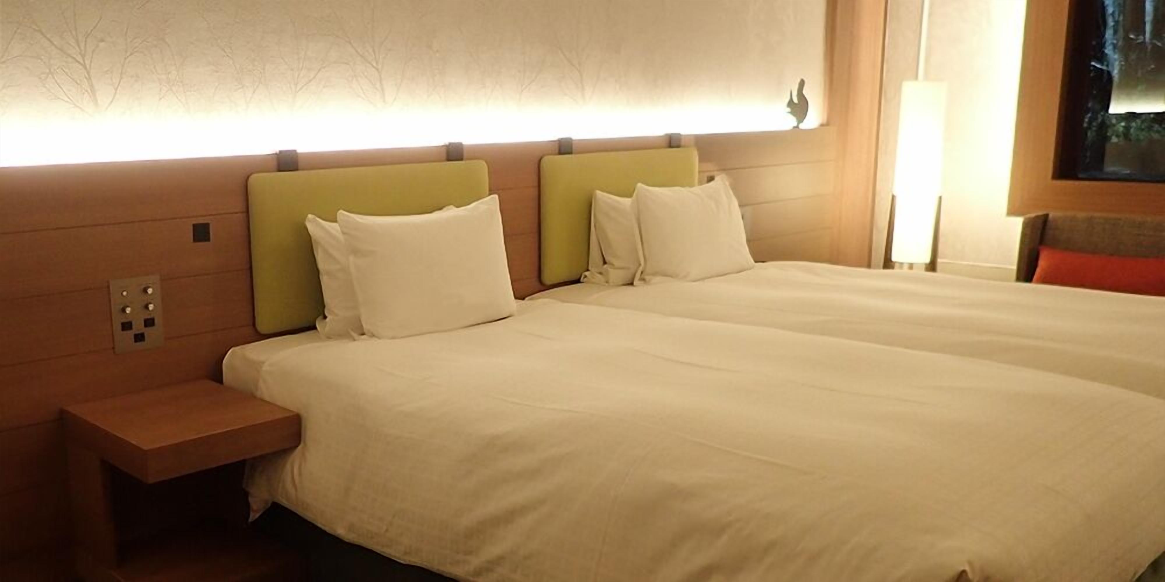 Habitación Deluxe, para no fumadores | Ropa de cama de alta calidad y cortinas blackout 