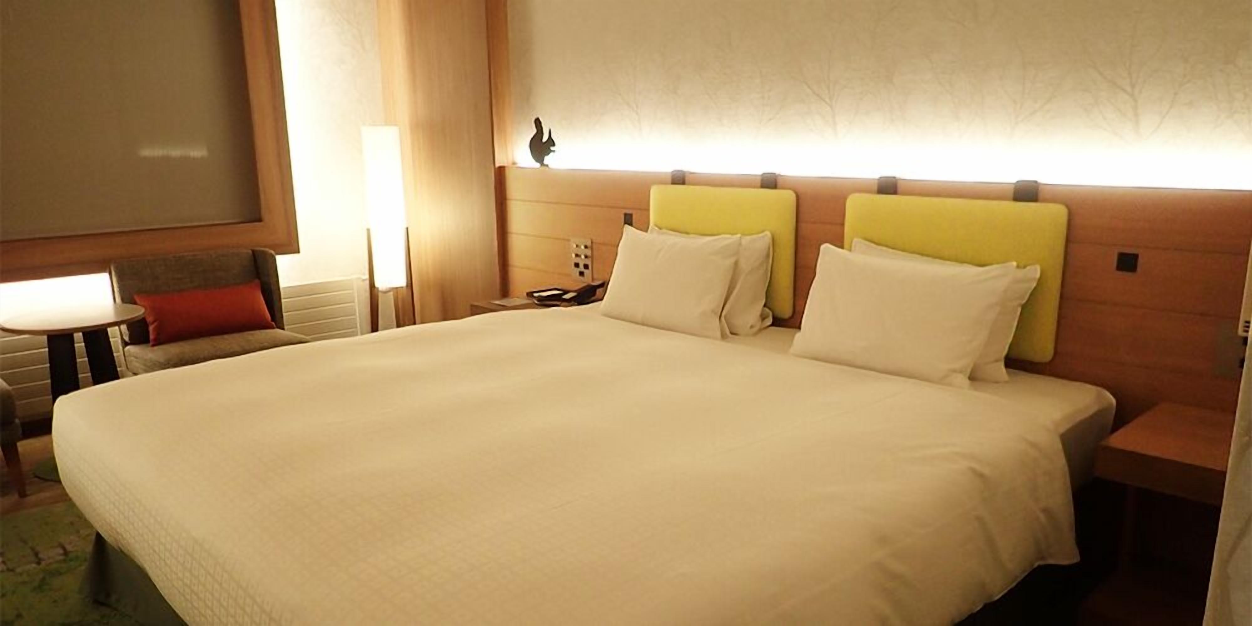 Habitación doble Deluxe, para no fumadores | Ropa de cama de alta calidad y cortinas blackout 