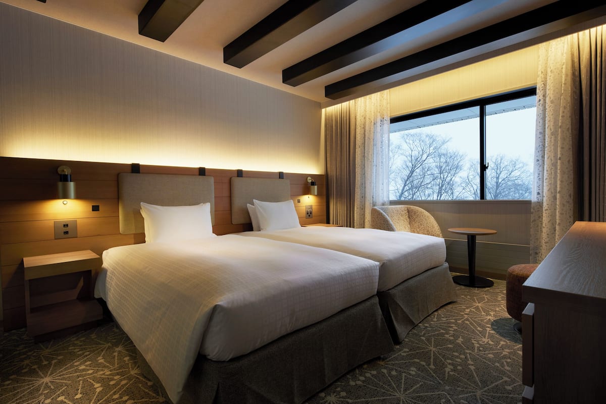 Junior suite, niet-roken | Luxe beddengoed, verduisterende gordijnen, een strijkplank/strijkijzer