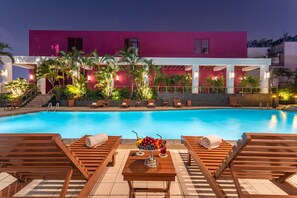 Outdoor pool, open 7:00 AM to 9:00 PM, pool umbrellas, pool loungers