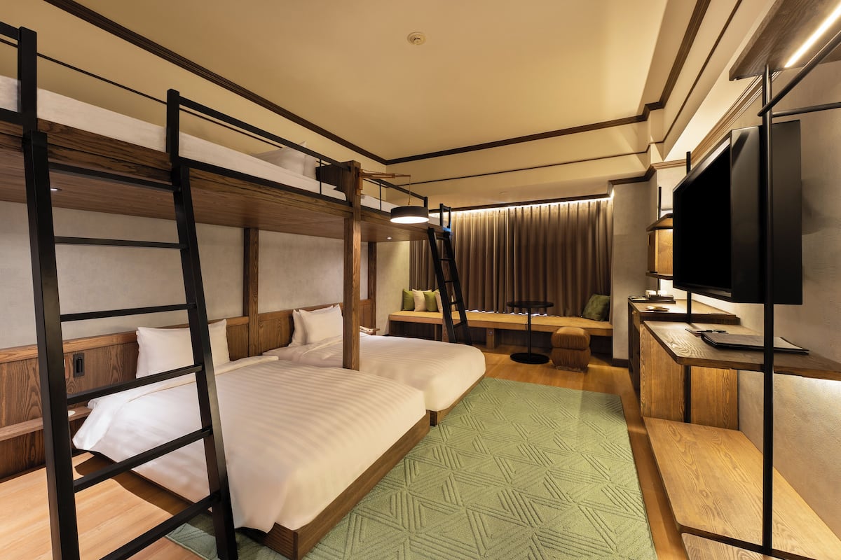 Premier Quad Room | Premium bedding, minibar, in-room safe, laptop workspace