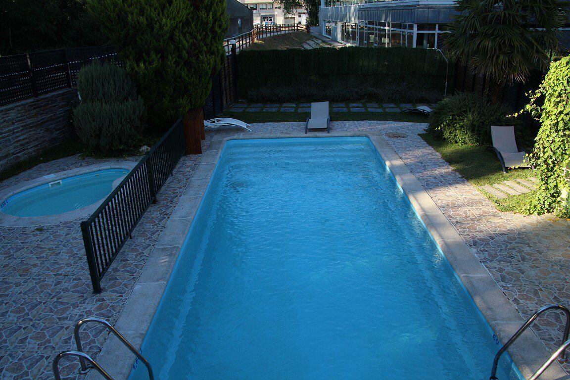 seasonal outdoor pool, open 10:00 am to 8:00 pm, pool umbrellas