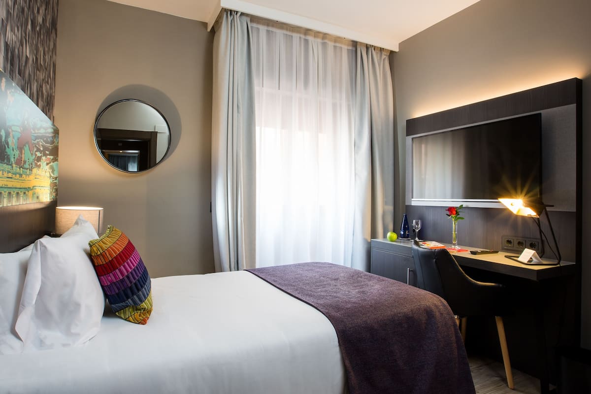 Economy Single Room | In-room safe, desk, free WiFi, bed sheets