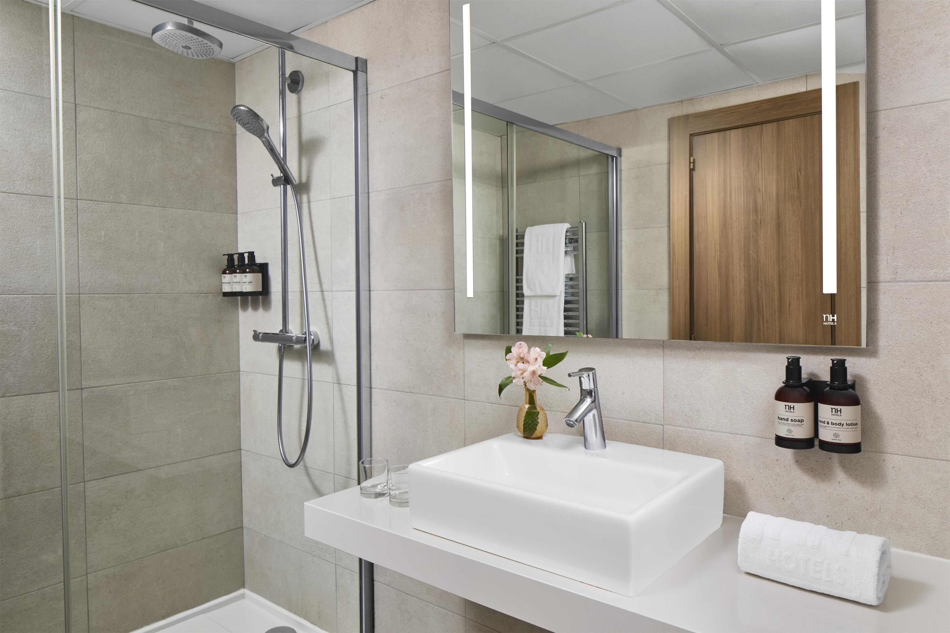 eco-friendly toiletries, hair dryer, bidet, towels